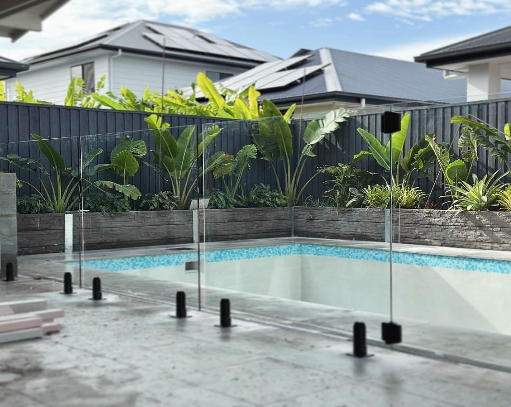 Full Flex installing a glass pool fence in a Brisbane home
