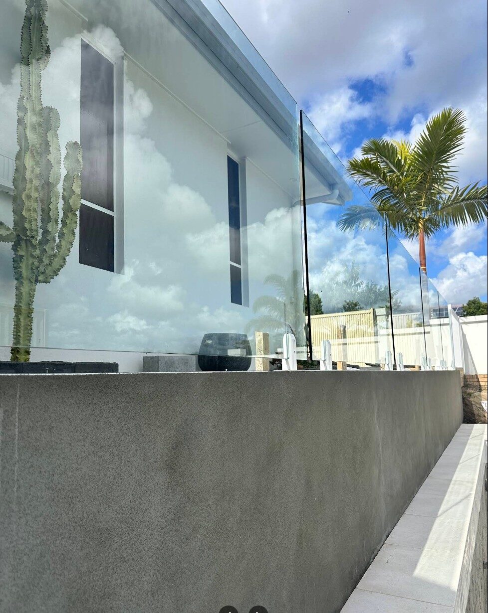 A retaining wall adding structure and style to a residential property in Brisbane
