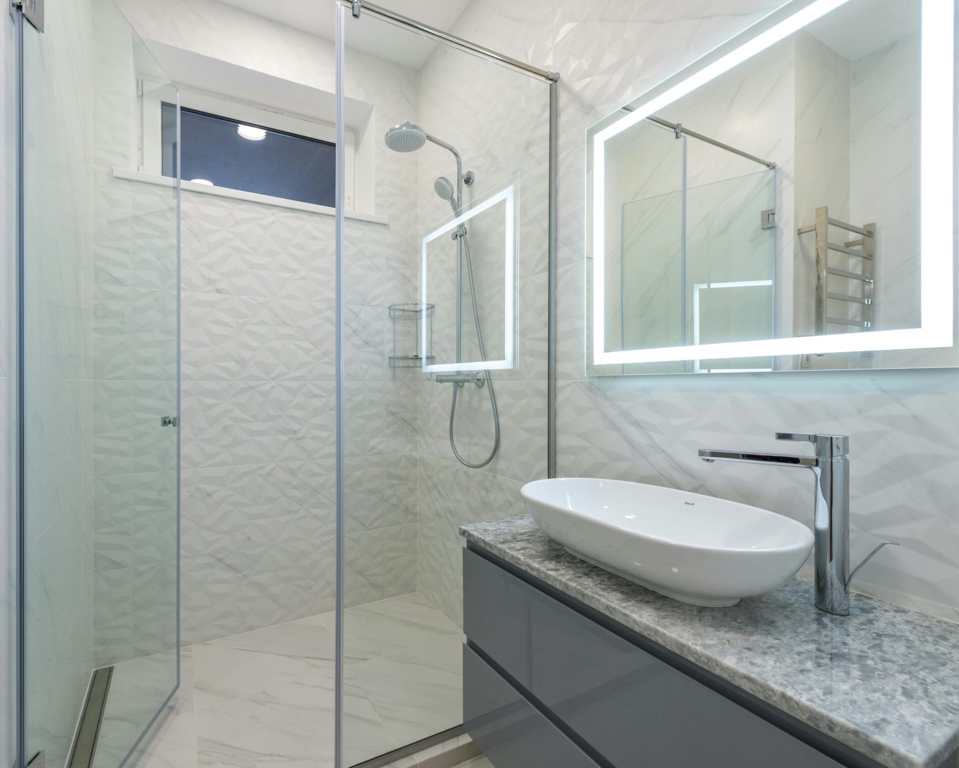 A professionally installed shower screen in a newly renovated Brisbane bathroom